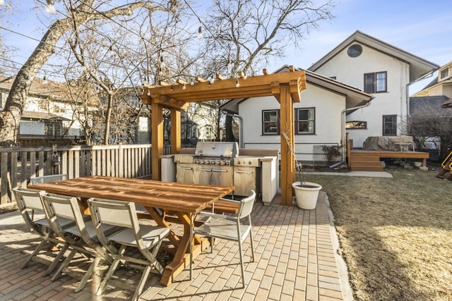 519 N Elmwood Ave, Oak Park, IL 60302 - view of patio / terrace with a deck, outdoor dining space, and exterior kitchen