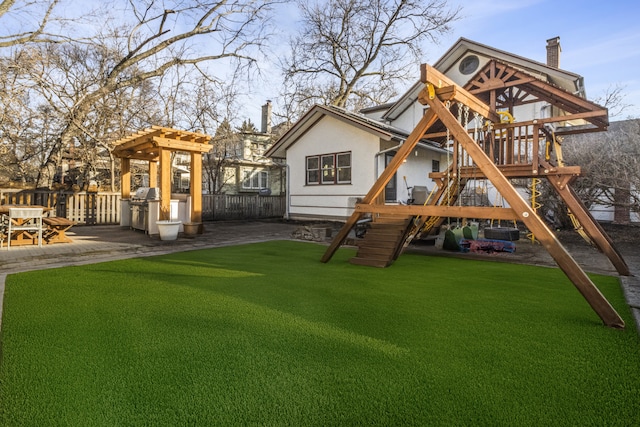 519 N Elmwood Ave, Oak Park, IL 60302 - view of jungle gym featuring exterior kitchen and a patio