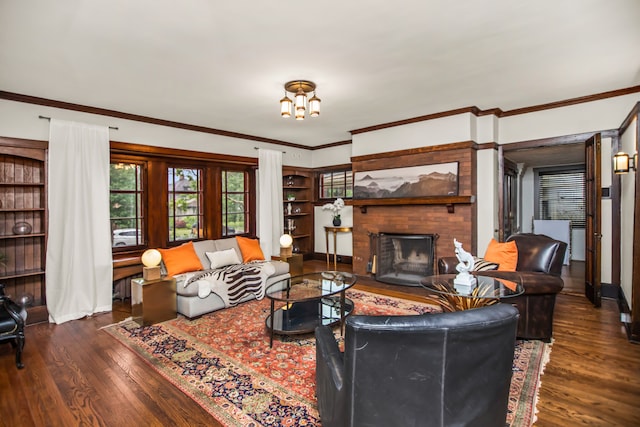 519 N Elmwood Ave, Oak Park, IL 60302 - living room with a brick fireplace, wood finished floors, and ornamental molding