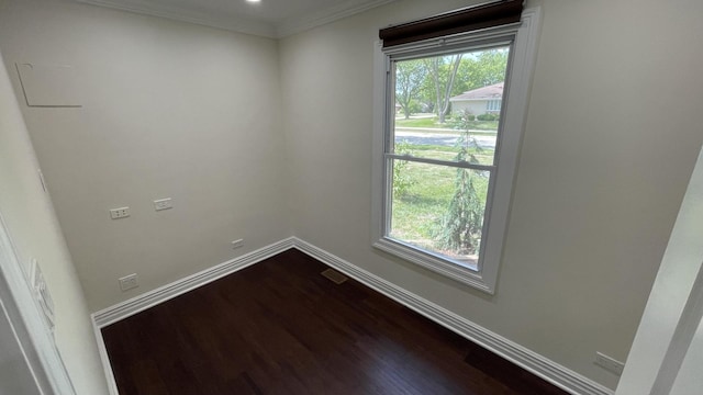 513 Laurel St, Elk Grove Village, IL 60007 - unfurnished room with dark wood-style floors, healthy amount of natural light, and crown molding