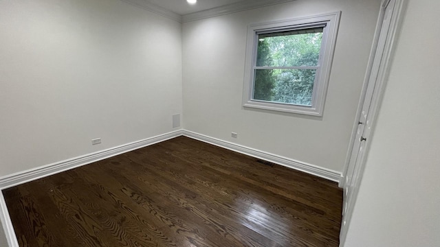 513 Laurel St, Elk Grove Village, IL 60007 - spare room featuring dark wood-style flooring and crown molding