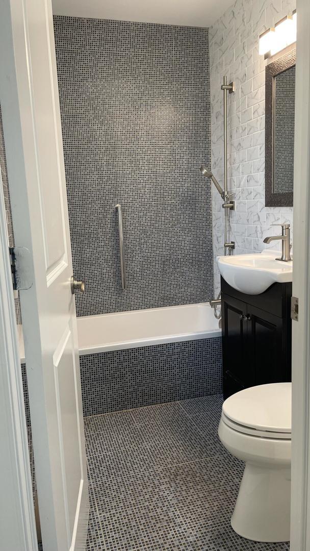 513 Laurel St, Elk Grove Village, IL 60007 - full bath with vanity, tile patterned flooring, and tiled shower / bath combo