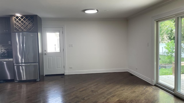 513 Laurel St, Elk Grove Village, IL 60007 - unfurnished dining area featuring crown molding and dark wood finished floors