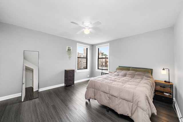 7409 N Seeley Ave Unit 2B, Chicago, IL 60645 - bedroom featuring dark wood-style flooring, a ceiling fan, and a baseboard radiator