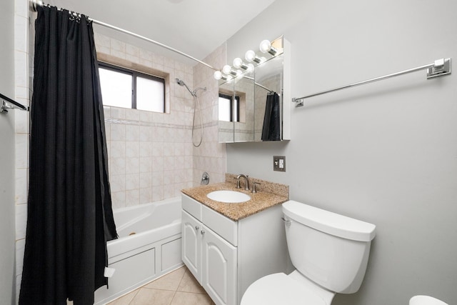 7409 N Seeley Ave Unit 2B, Chicago, IL 60645 - bathroom featuring shower / tub combo with curtain, vanity, and tile patterned floors
