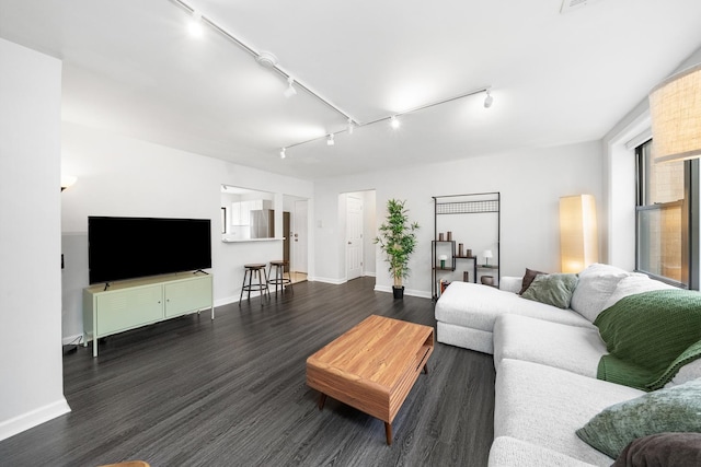7409 N Seeley Ave Unit 2B, Chicago, IL 60645 - living room featuring dark wood-type flooring and track lighting