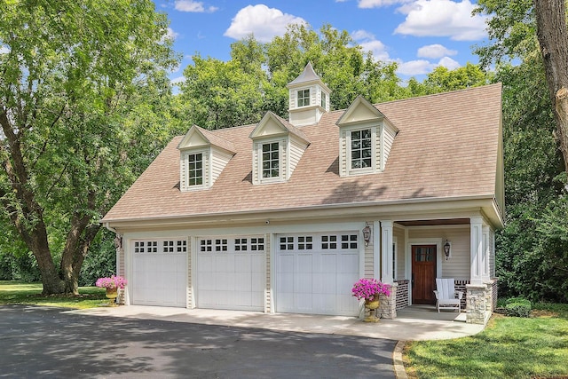 15606 W Sweedler Rd, Manhattan, IL 60442 - view of front of house featuring a garage and a shingled roof