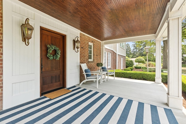 15606 W Sweedler Rd, Manhattan, IL 60442 - view of exterior entry with covered porch and brick siding