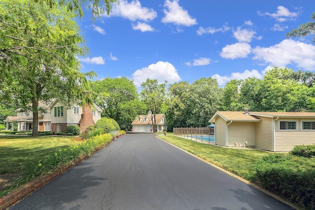 15606 W Sweedler Rd, Manhattan, IL 60442 - view of asphalt road with view of wooded area