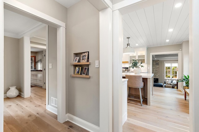 15606 W Sweedler Rd, Manhattan, IL 60442 - hallway with light wood-type flooring, recessed lighting, and ornamental molding