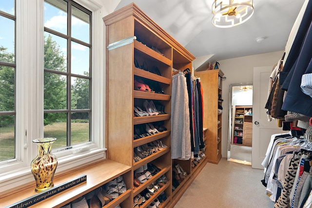 15606 W Sweedler Rd, Manhattan, IL 60442 - walk in closet featuring carpet floors, a chandelier, and vaulted ceiling