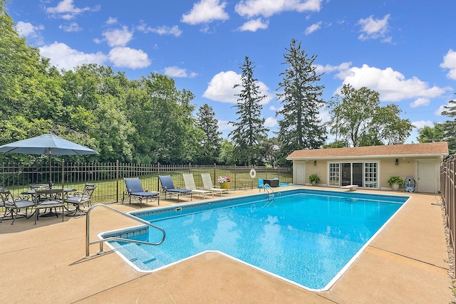 15606 W Sweedler Rd, Manhattan, IL 60442 - view of swimming pool with a patio area, an outdoor structure, a storage structure, and a diving board
