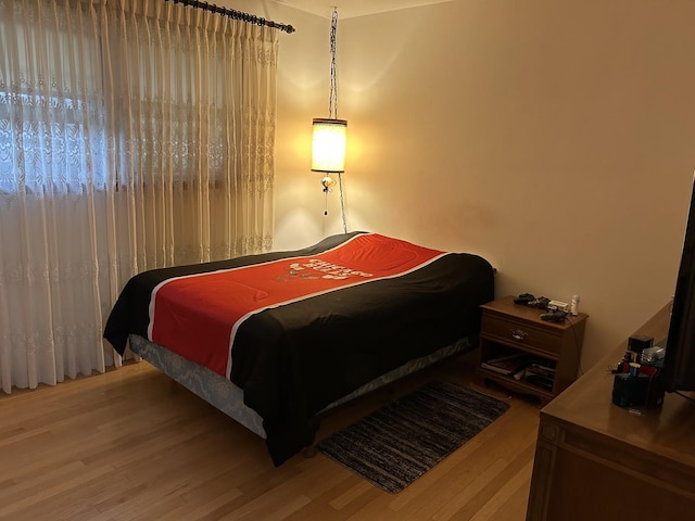 9362 Clancy Dr, Des Plaines, IL 60016 - bedroom with wood finished floors