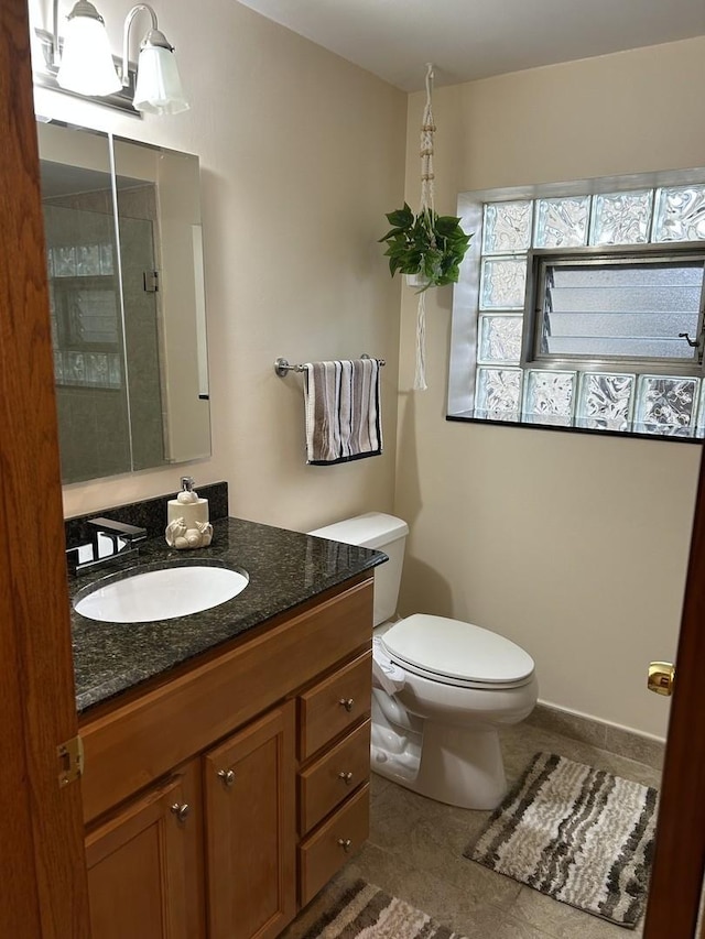 9362 Clancy Dr, Des Plaines, IL 60016 - bathroom with vanity and tile patterned floors