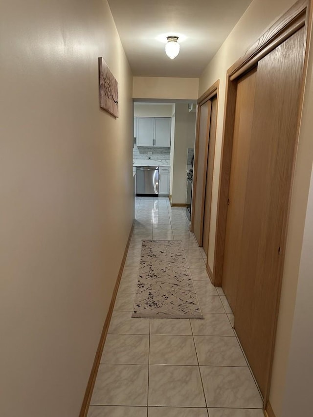 9362 Clancy Dr, Des Plaines, IL 60016 - corridor with light tile patterned flooring
