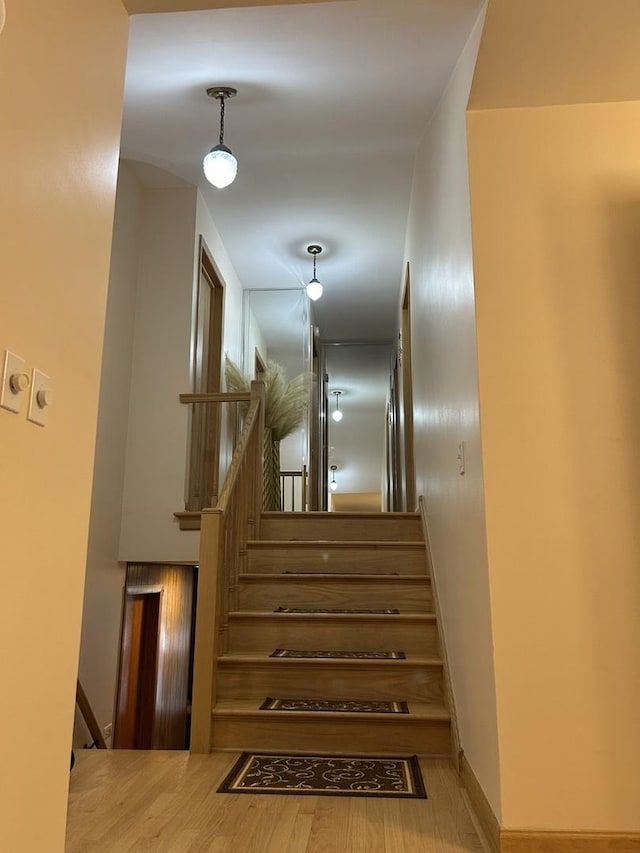 9362 Clancy Dr, Des Plaines, IL 60016 - stairway with wood finished floors