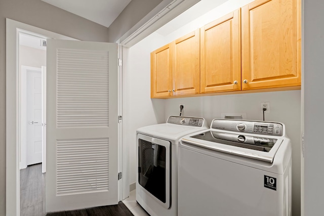 21 E Huron St Unit 3704, Chicago, IL 60611 - laundry room with cabinet space, washer and dryer, and wood finished floors
