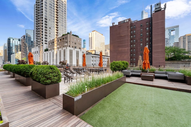 21 E Huron St Unit 3704, Chicago, IL 60611 - view of property's community featuring a view of skyline and an outdoor living space