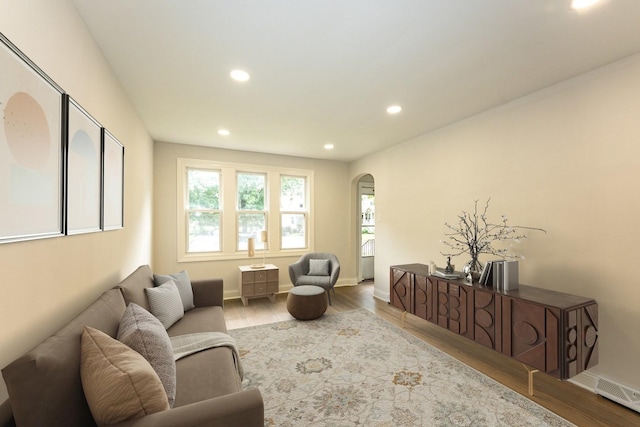 10940 S Trumbull Ave, Chicago, IL 60655 - living area featuring arched walkways, recessed lighting, and wood finished floors