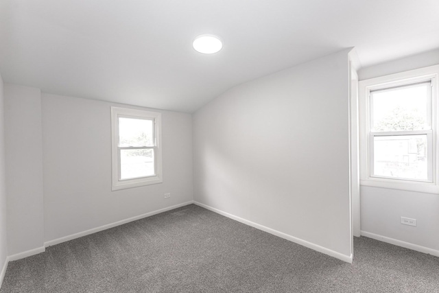 10940 S Trumbull Ave, Chicago, IL 60655 - carpeted empty room featuring lofted ceiling and baseboards
