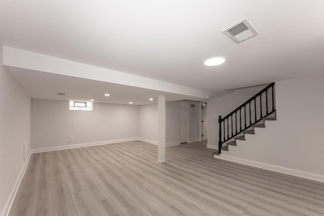 10940 S Trumbull Ave, Chicago, IL 60655 - below grade area with light wood-style floors, stairway, and recessed lighting