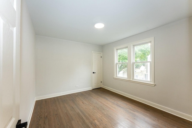 10940 S Trumbull Ave, Chicago, IL 60655 - empty room with dark wood-type flooring and baseboards