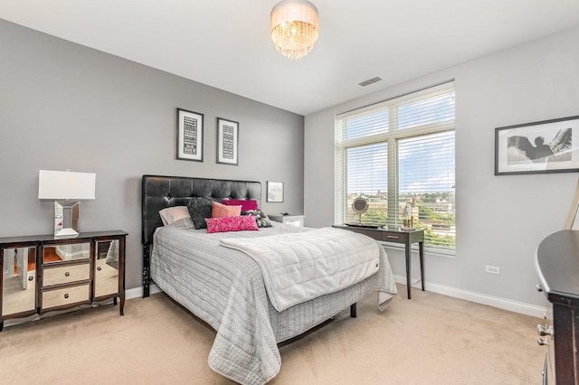 140 S River St Unit 307, Aurora, IL 60506 - bedroom featuring multiple windows and light carpet