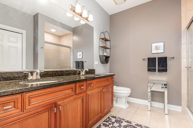 140 S River St Unit 307, Aurora, IL 60506 - full bath with a stall shower, double vanity, and tile patterned flooring