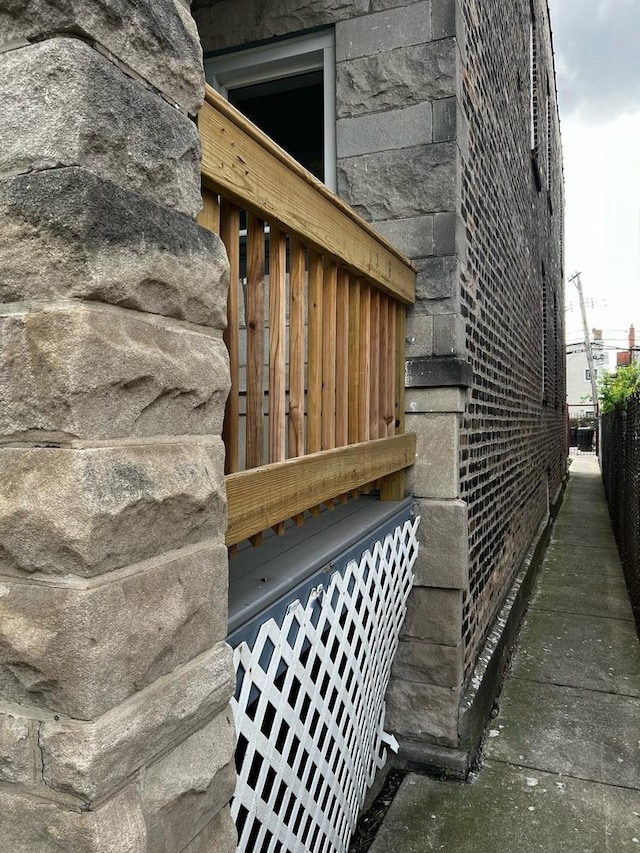 730 N Spaulding Ave, Chicago, IL 60624 - view of side of home featuring stone siding