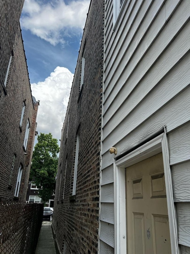 730 N Spaulding Ave, Chicago, IL 60624 - view of side of property featuring brick siding