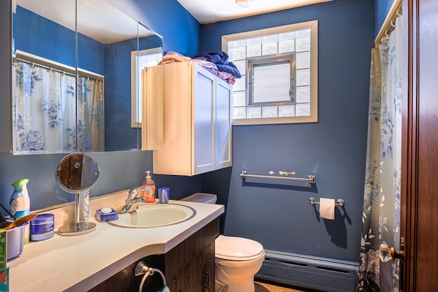 4751 S Hamlin Ave, Chicago, IL 60632 - full bathroom featuring a baseboard heating unit, vanity, and a shower with curtain