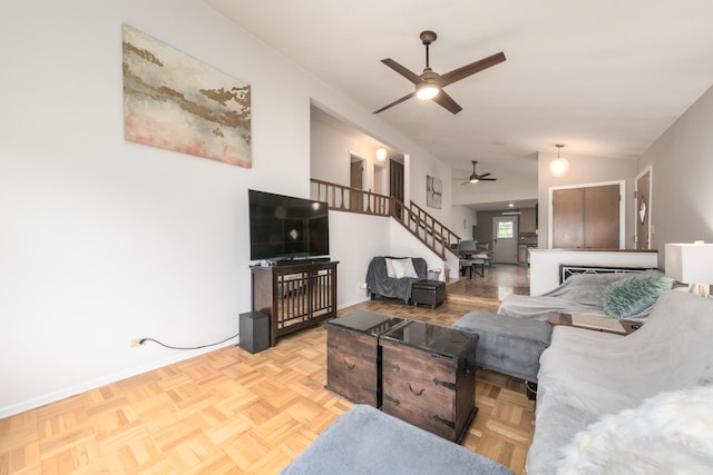 1231 N Hamlin Ave, Park Ridge, IL 60068 - living room featuring a ceiling fan, a fireplace, and stairs