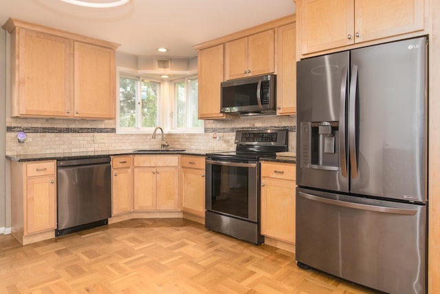 1231 N Hamlin Ave, Park Ridge, IL 60068 - kitchen featuring appliances with stainless steel finishes, light brown cabinetry, backsplash, recessed lighting, and dark stone countertops
