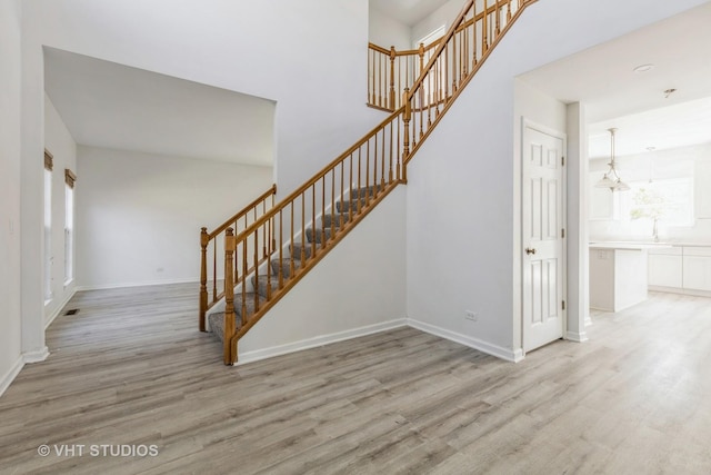 2895 Lahinch Ct, Aurora, IL 60503 - stairs with wood finished floors and a high ceiling