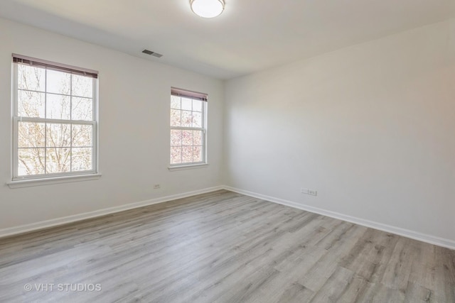2895 Lahinch Ct, Aurora, IL 60503 - spare room featuring light wood-type flooring and baseboards