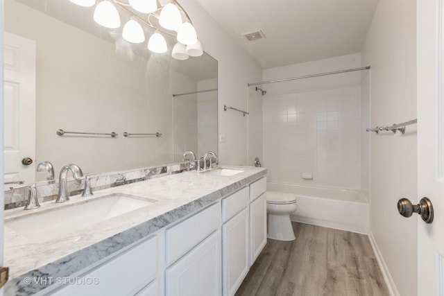 2895 Lahinch Ct, Aurora, IL 60503 - bathroom with bathing tub / shower combination, wood finished floors, and double vanity