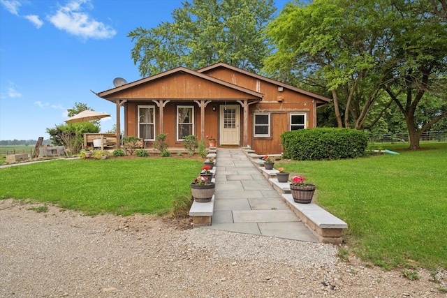 16383 US Highway 52, Newark, IL 60541 - bungalow-style home with a porch and a front lawn