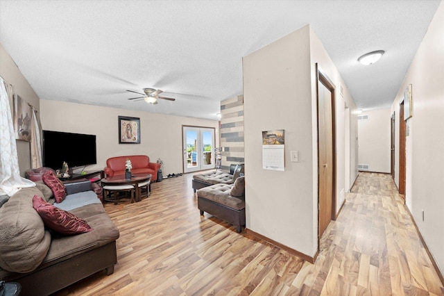 16383 US Highway 52, Newark, IL 60541 - living area with light wood finished floors, ceiling fan, and a textured ceiling