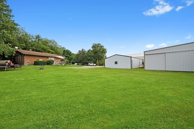16383 US Highway 52, Newark, IL 60541 - view of grassy yard with a pole building and an outdoor structure