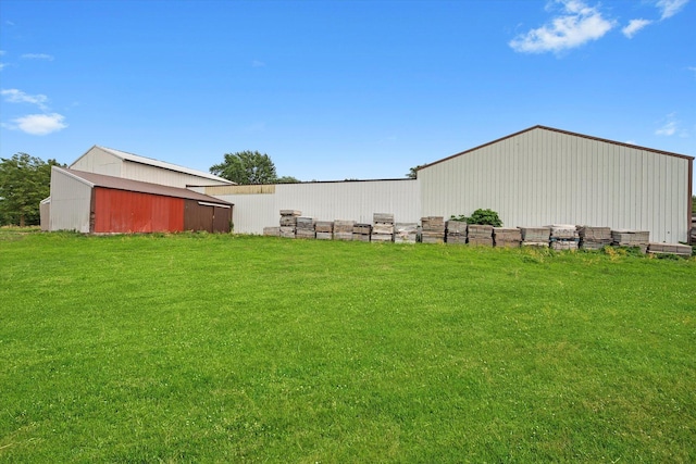 16383 US Highway 52, Newark, IL 60541 - view of green lawn featuring a pole building and an outbuilding