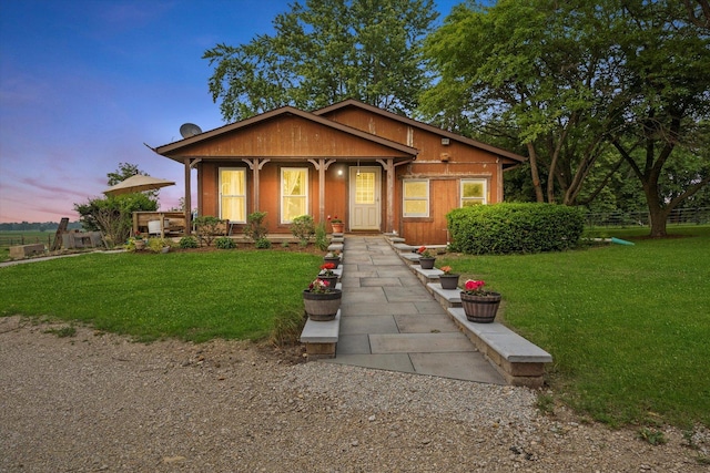 16383 US Highway 52, Newark, IL 60541 - bungalow-style house featuring covered porch and a front yard