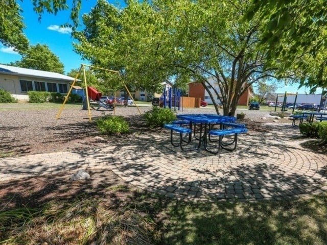 8928 Stevens Dr Unit 1A, Des Plaines, IL 60016 - community jungle gym featuring outdoor dining area