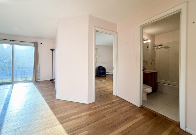 8928 Stevens Dr Unit 1A, Des Plaines, IL 60016 - hall with light wood-style flooring and baseboards