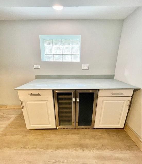 9302 S Eberhart Ave, Chicago, IL 60619 - indoor dry bar featuring light wood-style floors and beverage cooler