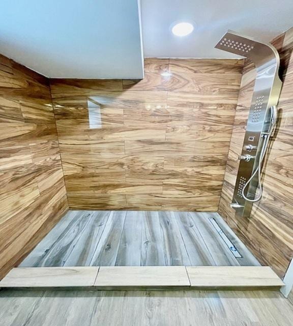 9302 S Eberhart Ave, Chicago, IL 60619 - detailed view of a tile shower, a sauna, and wood finished floors