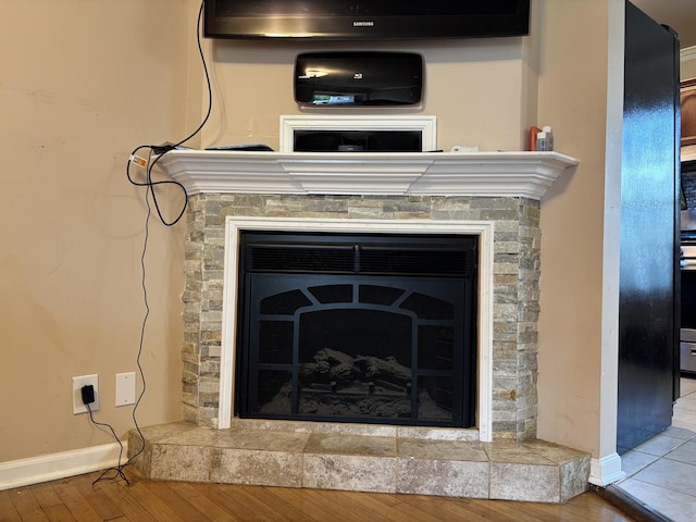 2715 W Ridgeland Ave, Waukegan, IL 60085 - detailed view of wood finished floors and a fireplace