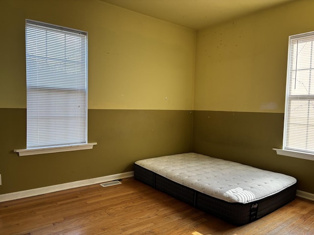 2715 W Ridgeland Ave, Waukegan, IL 60085 - bedroom with wood finished floors and baseboards