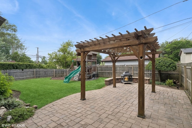 1315 Ardmore Dr, Round Lake Beach, IL 60073 - fenced backyard with a playground, a patio area, and a pergola