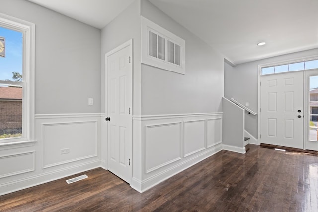 15355 7th Ave, Phoenix, IL 60426 - entrance foyer featuring dark wood-style flooring, a wainscoted wall, stairs, a decorative wall, and recessed lighting