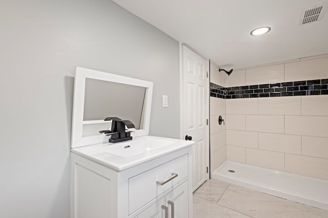 15355 7th Ave, Phoenix, IL 60426 - full bathroom featuring tiled shower, vanity, marble finish flooring, and recessed lighting